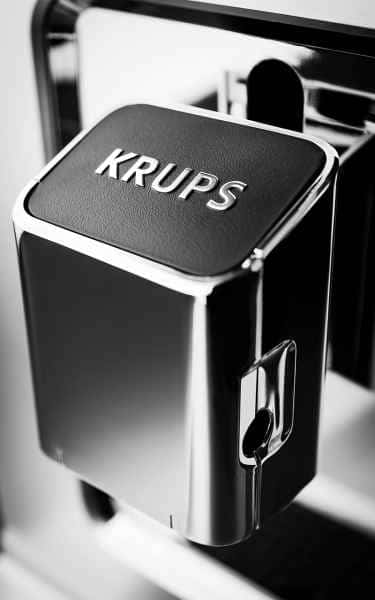 photographe nature morte post production krups machine cafe logo